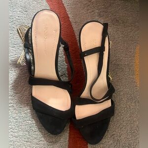 Lightly used BCBG heels with side bow.